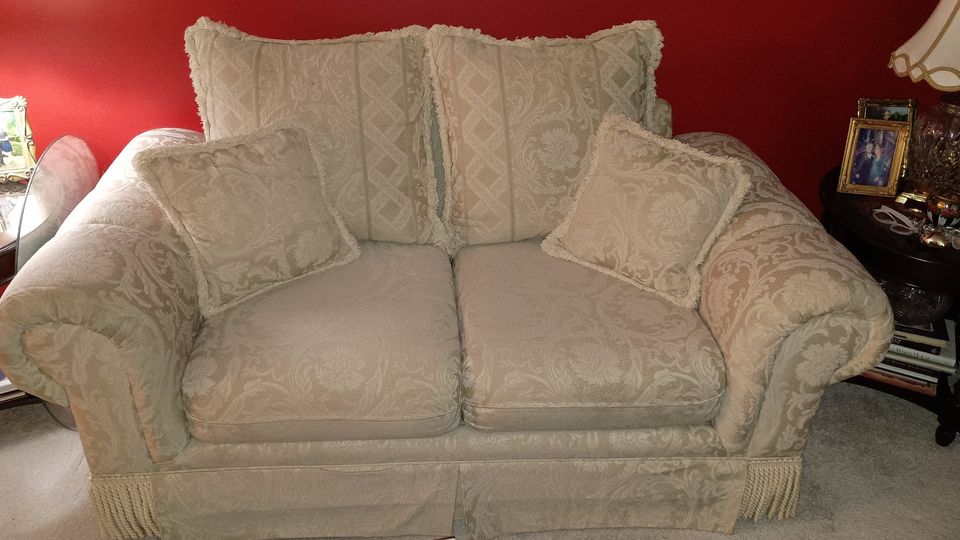 Broyhill Cream Loveseat with Traditional Designs